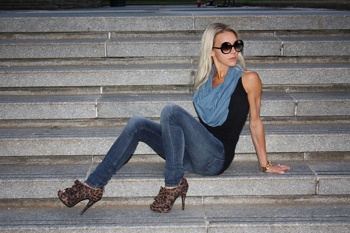 organic clothing on woman sitting on steps