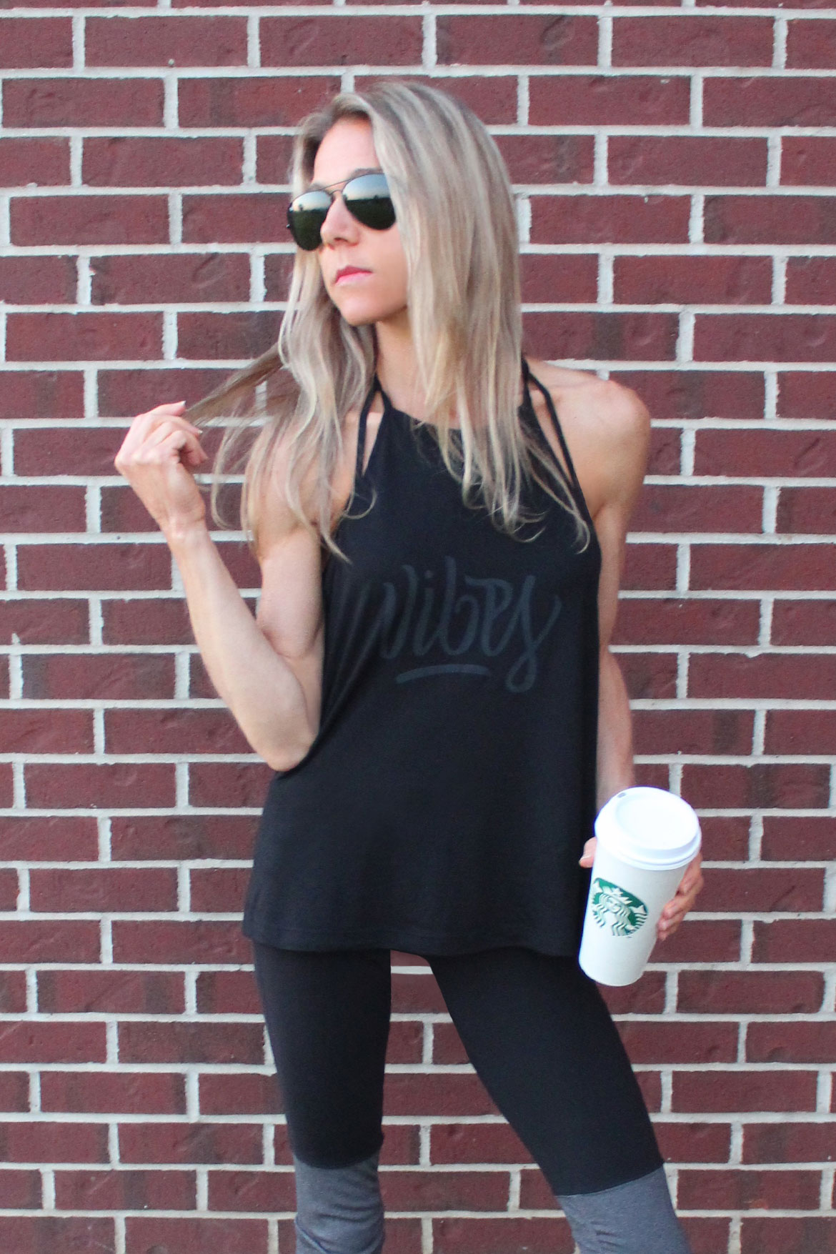 Deba Wilson wearing Golden Rhino’s Vibes tank